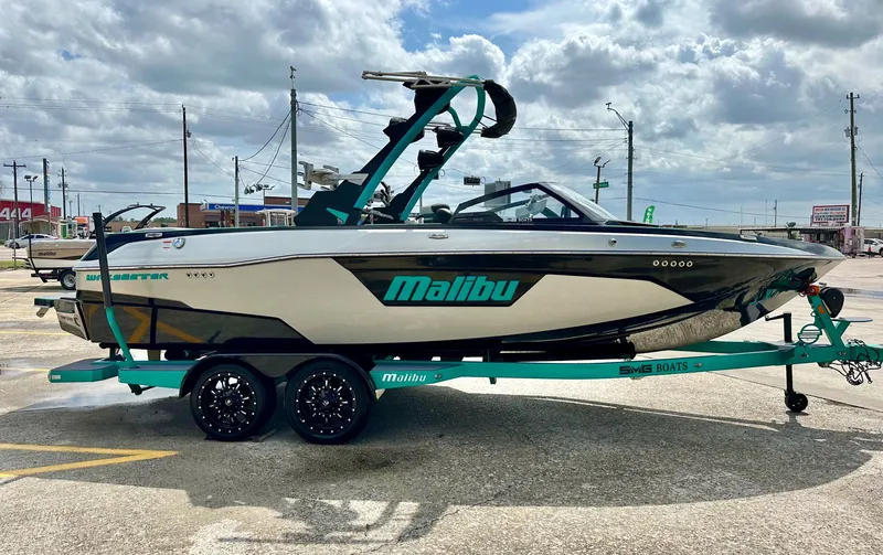 Slide: The Image of 2022 Malibu Wakesetter 23 LSV boat on trailer, side view. - 2