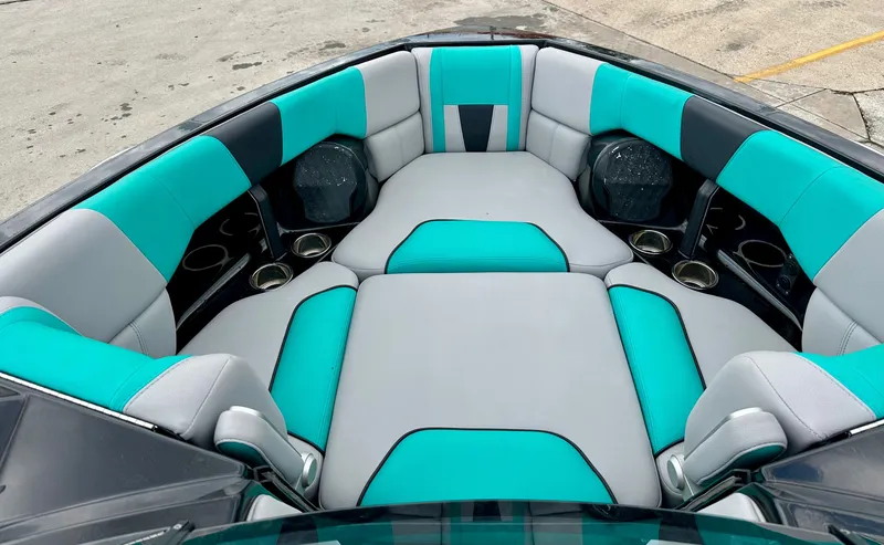 Slide: The Image of Interior of 2022 Malibu Wakesetter 23 LSV with turquoise seating. - 7