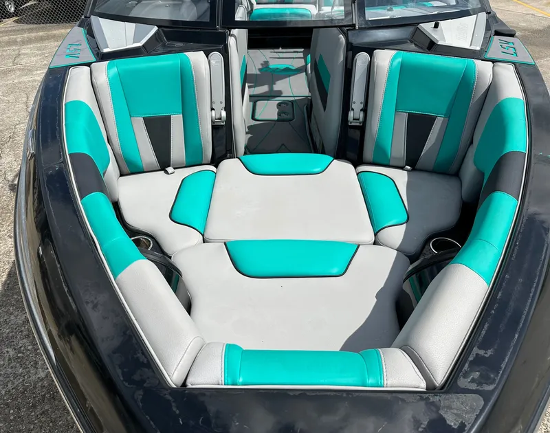 Slide: The Image of Interior of 2022 Malibu Wakesetter 23 LSV with turquoise seating. - 8