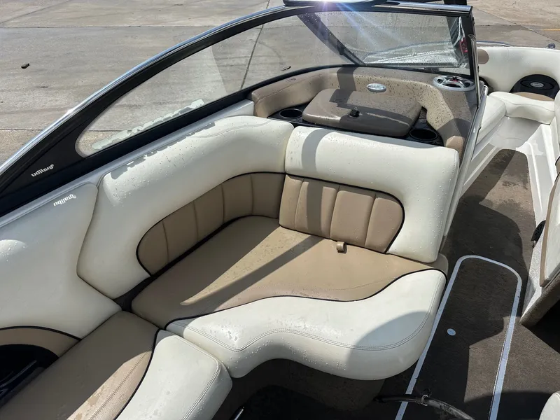 Slide: The Image of Interior of a 2005 Malibu Sunscape 23 LSV with beige seating. - 17