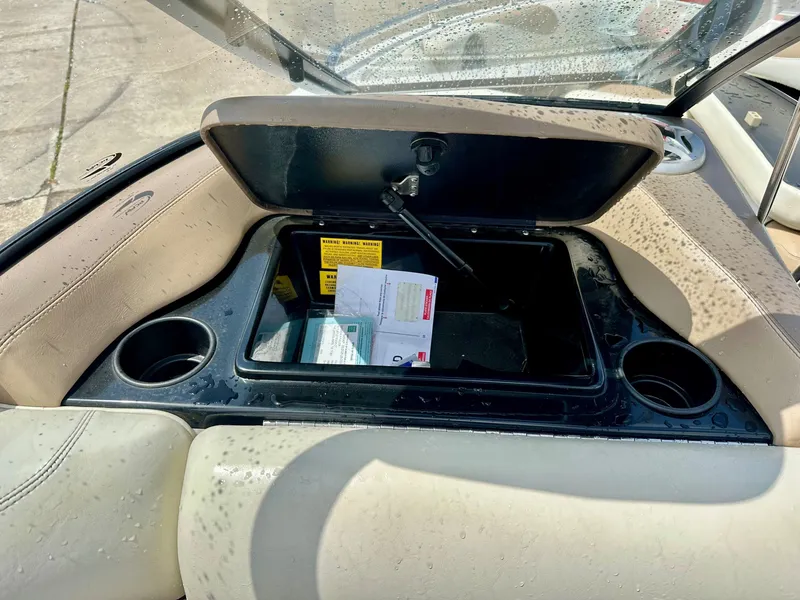 Slide: The Image of 2005 Malibu Sunscape 23 LSV boat compartment with documents. - 18