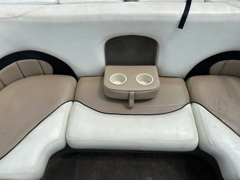 Slide: The Image of Interior of a 2005 Malibu Sunscape 23 LSV with beige seating. - 21
