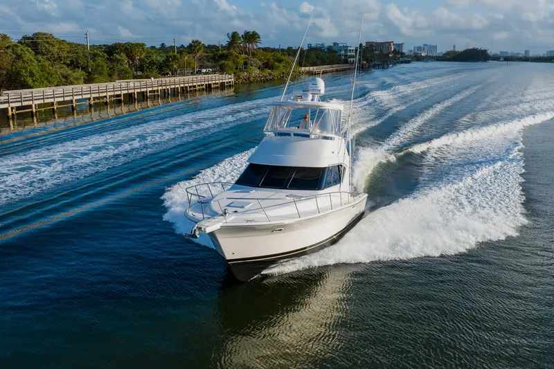 Slide: The Image of 2003 Wellcraft 400 Coastal yacht cruising on a scenic waterway. - 10