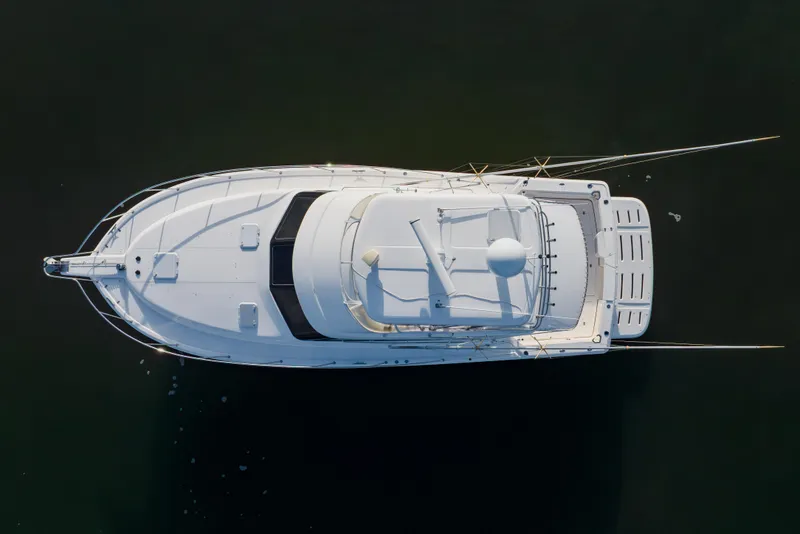 Slide: The Image of Aerial view of 2003 Wellcraft 400 Coastal yacht on calm water. - 12