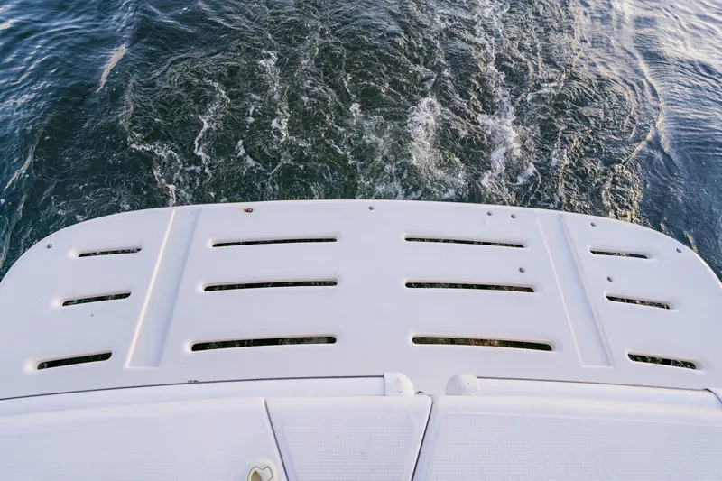 Slide: The Image of Rear view of 2003 Wellcraft 400 Coastal boat on water. - 14