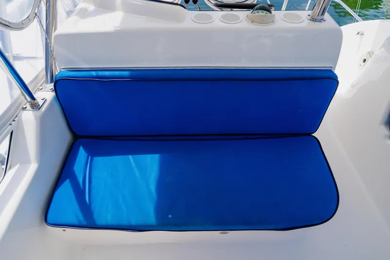 Slide: The Image of Blue cushioned seat on 2003 Wellcraft 400 Coastal boat deck. - 59