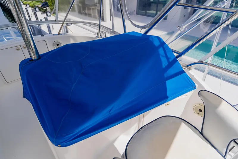 Slide: The Image of Blue-covered helm station on 2003 Wellcraft 400 Coastal boat. - 66