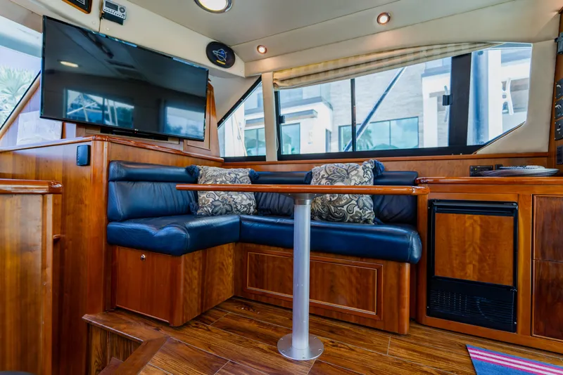 Slide: The Image of Luxurious interior of 2003 Wellcraft 400 Coastal yacht with plush seating and modern amenities. - 93