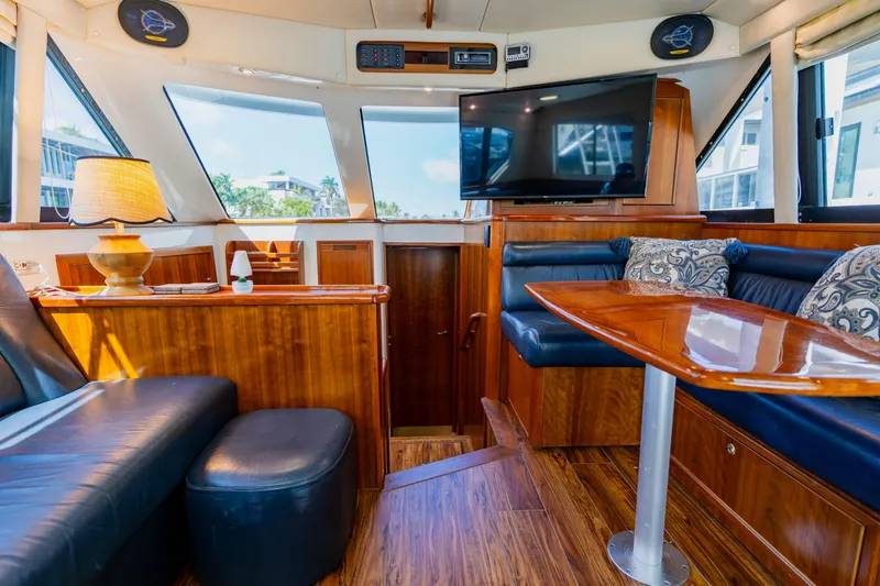 Slide: The Image of Luxurious interior of 2003 Wellcraft 400 Coastal yacht with wood finishes and modern amenities. - 94