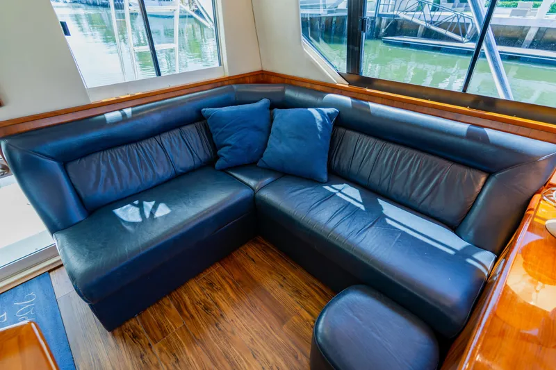 Slide: The Image of Luxurious interior of 2003 Wellcraft 400 Coastal yacht with blue leather seating. - 95
