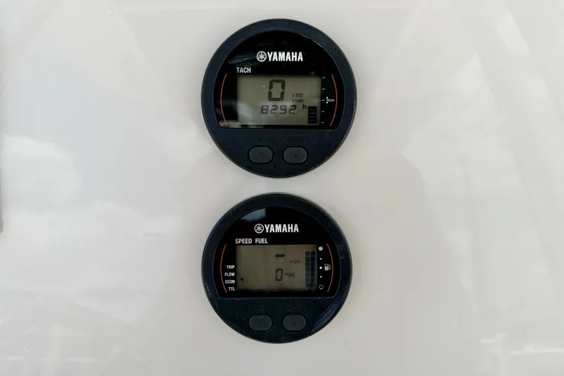 Slide: The Image of Yamaha digital gauges on 2024 Key West 239 FS boat dashboard. - 20