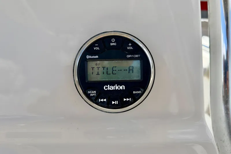 Slide: The Image of Clarion GR10BT stereo system on 2024 Key West 239 FS boat dashboard. - 21