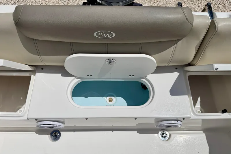 Slide: The Image of 2024 Key West 239 FS boat interior with livewell and seating area. - 26