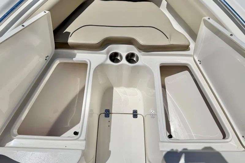 Slide: The Image of 2024 Key West 239 FS boat interior with storage compartments and seating. - 30