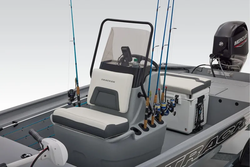 Slide: The Image of 2026 Tracker Bass Tracker Classic CC with fishing rods and motor. - 26