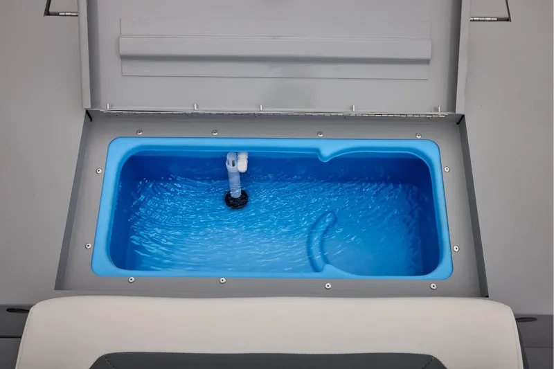 Slide: The Image of 2026 Tracker Bass Tracker Classic CC livewell with blue interior. - 47