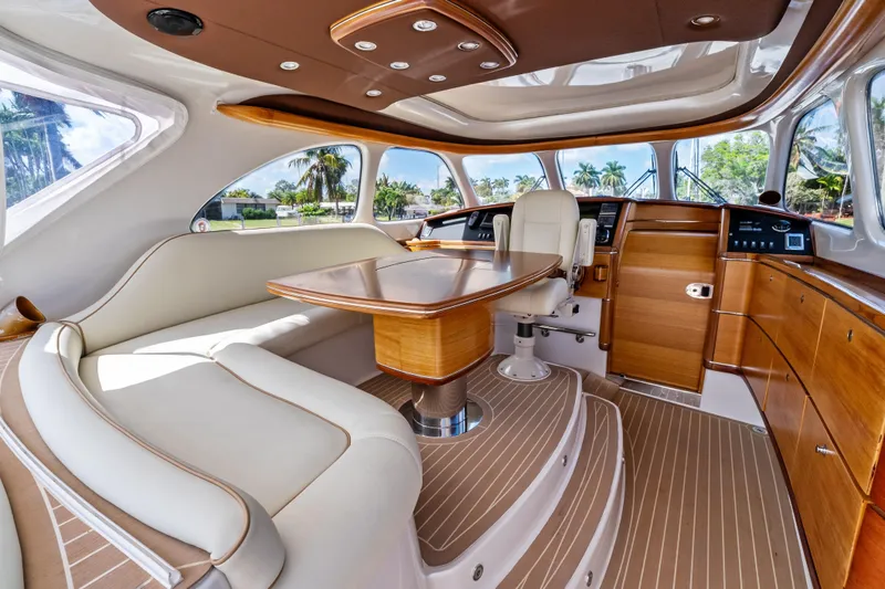Slide: The Image of Luxurious interior of 2012 Zeelander 44 yacht with elegant wood finishes and plush seating. - 10