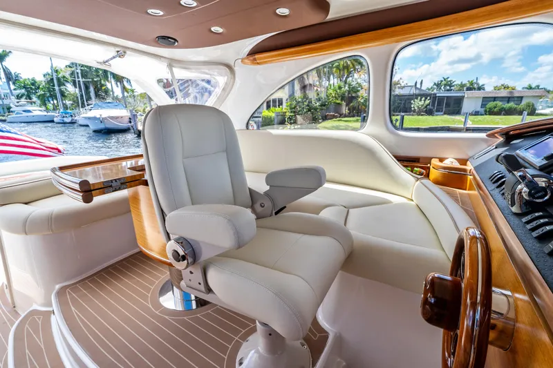 Slide: The Image of Luxurious interior of a 2012 Zeelander 44 yacht with plush seating and elegant wood finishes. - 12