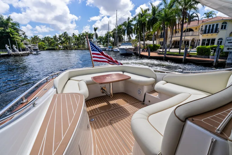 Slide: The Image of Luxurious 2012 Zeelander 44 yacht interior with elegant seating and scenic waterfront view. - 8