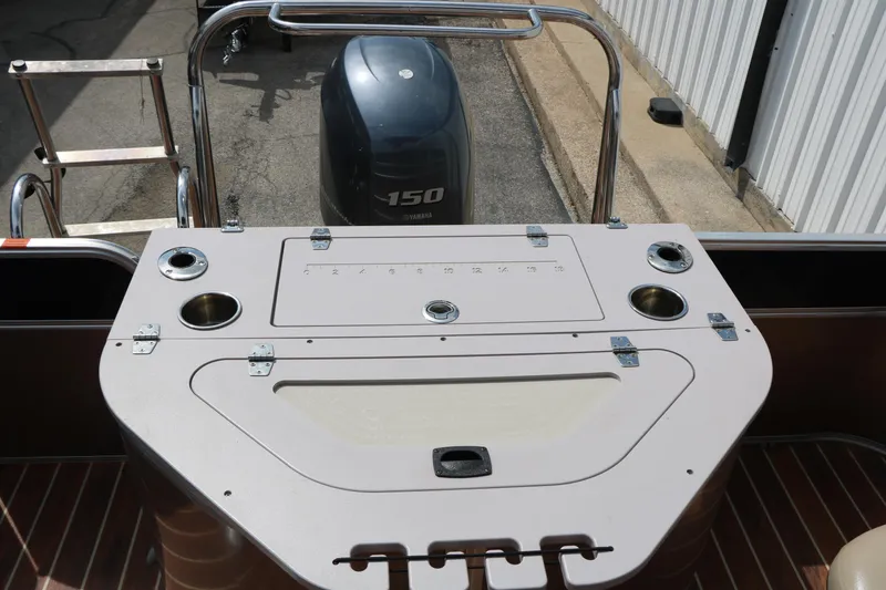 Slide: The Image of 2014 Xcursion X23F boat with Yamaha 150 engine and fishing station. - 20