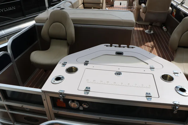 Slide: The Image of 2014 Xcursion X23F pontoon boat interior with seating and fishing station. - 47