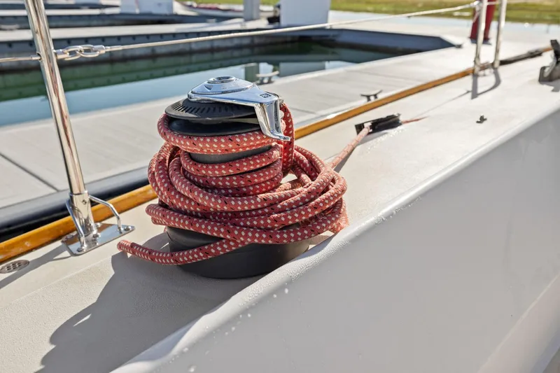 Slide: The Image of Coiled rope on deck of 2005 J Boats J/124 sailboat. - 12