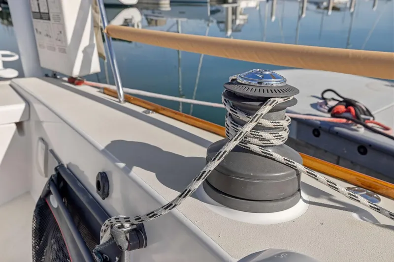 Slide: The Image of Winch on 2005 J Boats J/124 sailboat deck, with ropes coiled neatly. - 21