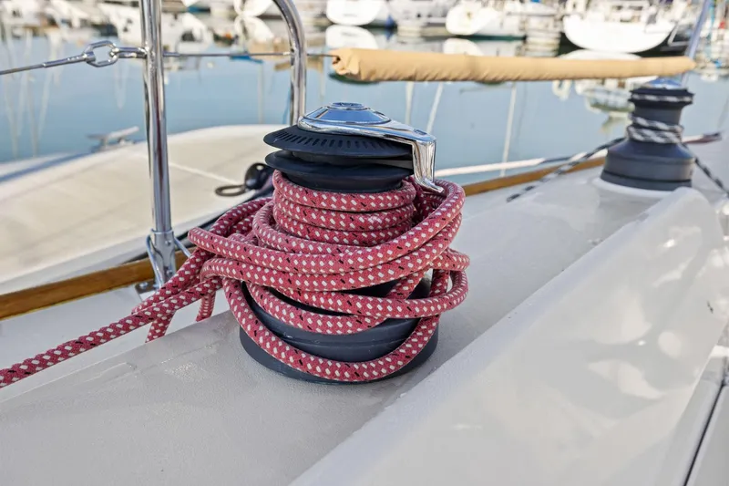 Slide: The Image of Red rope coiled on a winch aboard a 2005 J Boats J/124 sailboat. - 22