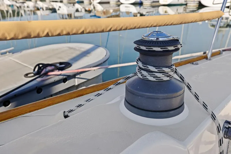 Slide: The Image of Close-up of a winch on a 2005 J Boats J/124 sailboat in a marina. - 23