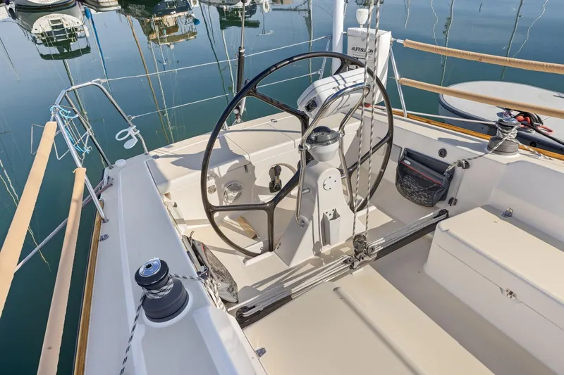 Slide: The Image of Cockpit of 2005 J Boats J/124 sailboat with steering wheel and winches. - 31