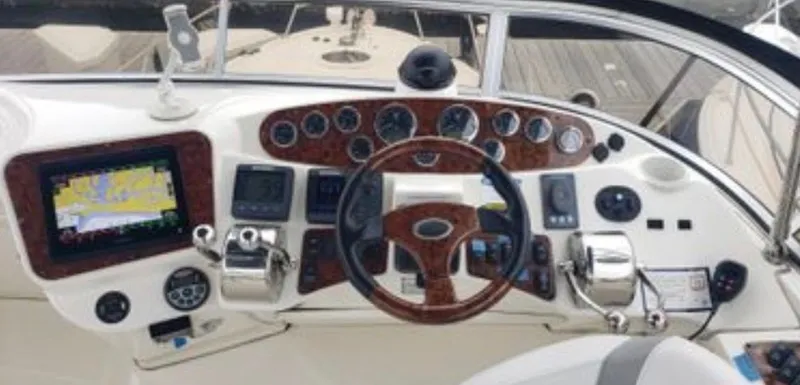 Slide: The Image of 2008 Meridian 341 Sedan boat helm with navigation system. - 10