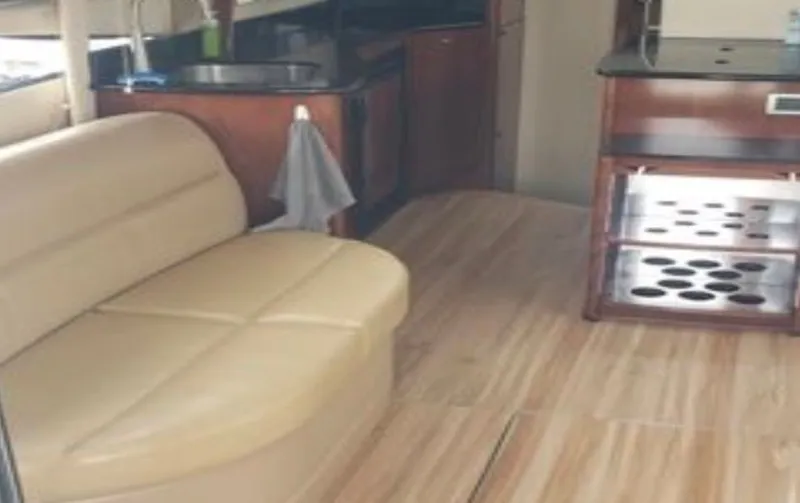 Slide: The Image of Interior of a 2008 Meridian 341 Sedan yacht with leather sofa. - 13