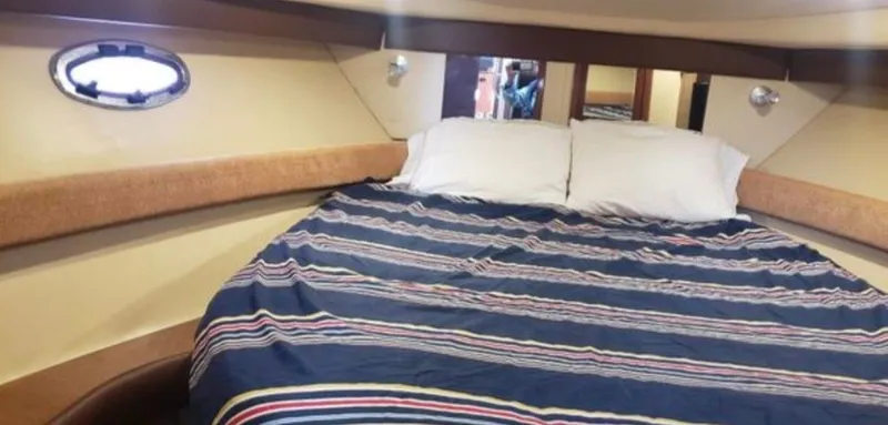 Slide: The Image of Interior of a 2008 Meridian 341 Sedan yacht with cozy bed. - 14