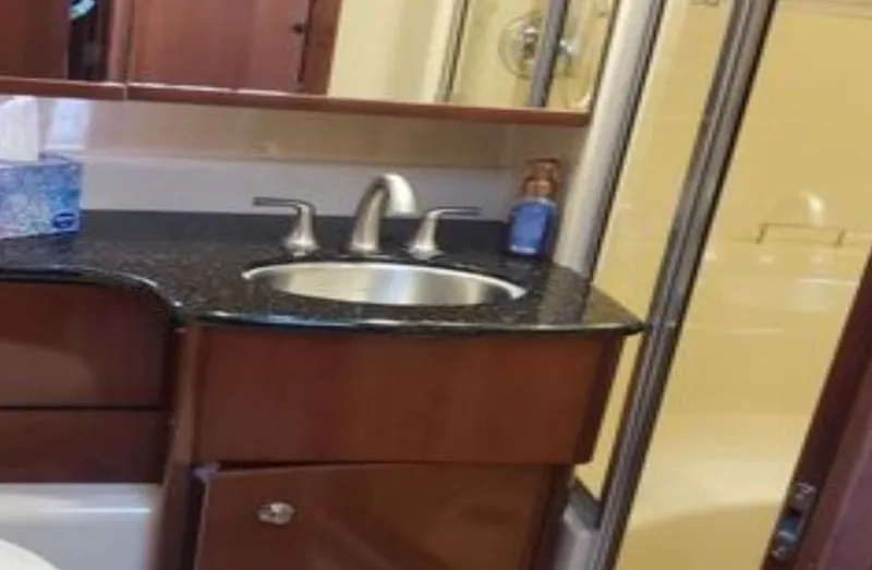 Slide: The Image of Bathroom in 2008 Meridian 341 Sedan with sink and mirror. - 16
