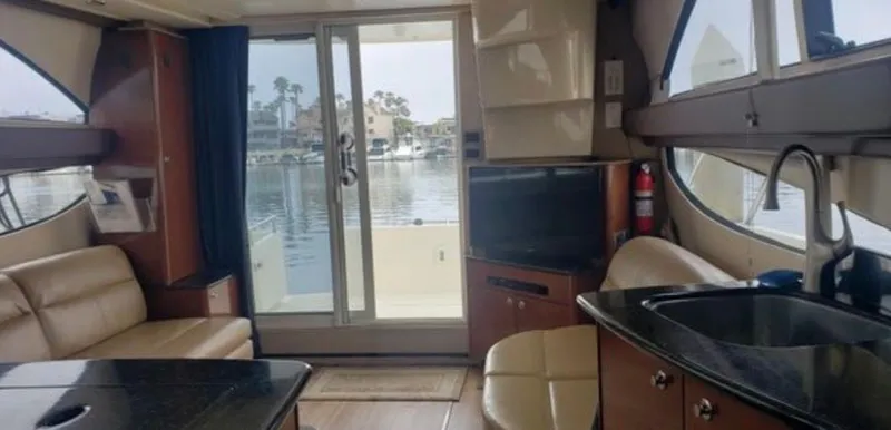 Slide: The Image of Interior of a 2008 Meridian 341 Sedan yacht overlooking the harbor. - 18