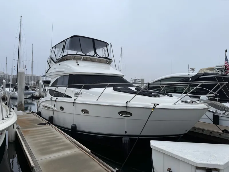 Slide: The Image of 2008 Meridian 341 Sedan yacht docked at marina. - 2