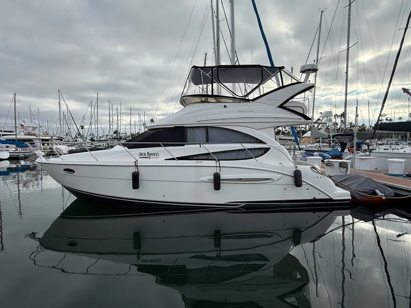 Slide: The Image of 2008 Meridian 341 Sedan yacht docked in marina, cloudy sky. - 5