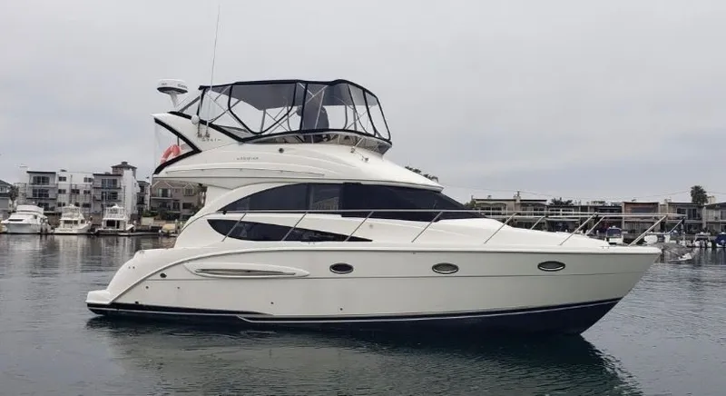 Slide: The Image of 2008 Meridian 341 Sedan yacht docked in harbor. - 7