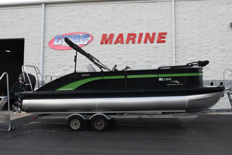 The Image of 2021 Bennington 24 SSBX pontoon boat on trailer at GPS Marine dealership. - 1
