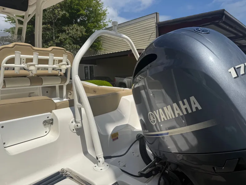 Slide: The Image of 2018 Key West 219 FS boat with Yamaha engine outdoors. - 3