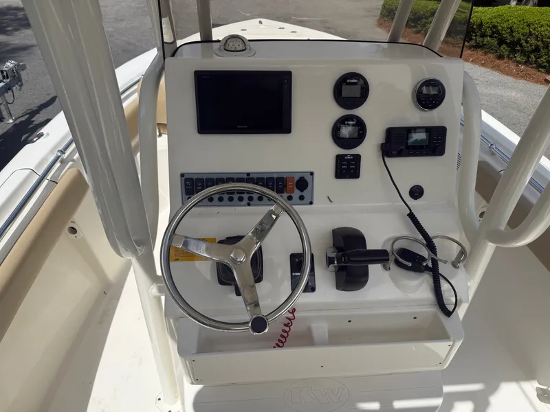 Slide: The Image of Helm console of a 2018 Key West 219 FS boat with instruments. - 6
