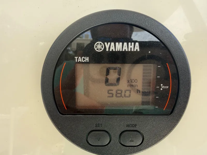 Slide: The Image of Yamaha tachometer on Key West 219 FS boat, 58 operating hours. - 7