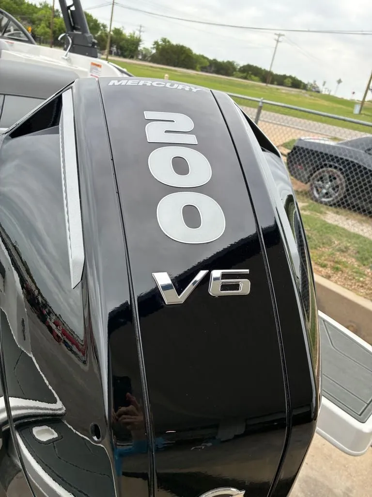 Slide: The Image of Mercury 200 V6 outboard motor on Bayliner D22, year 2026. - 14