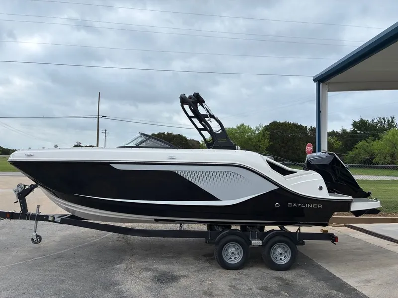 Slide: The Image of 2026 Bayliner D22 boat on trailer, side view. - 16