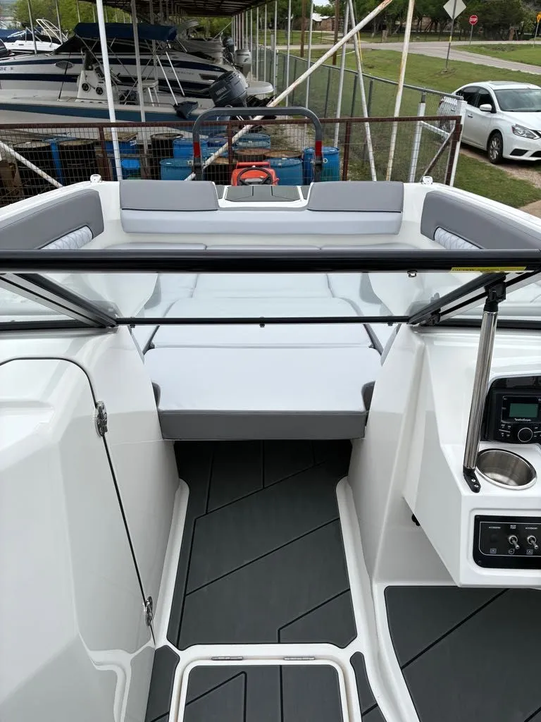 Slide: The Image of Interior view of Bayliner D22 boat, model year 2026. - 5