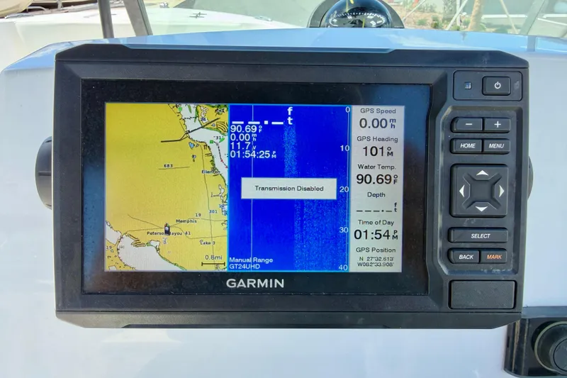Slide: The Image of Garmin GPS display on 2023 Aquasport 2200 Dual Console, showing navigation and water temperature. - 17