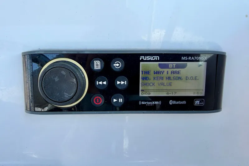 Slide: The Image of Fusion marine stereo on 2023 Aquasport 2200 Dual Console, playing "The Way I Are." - 21