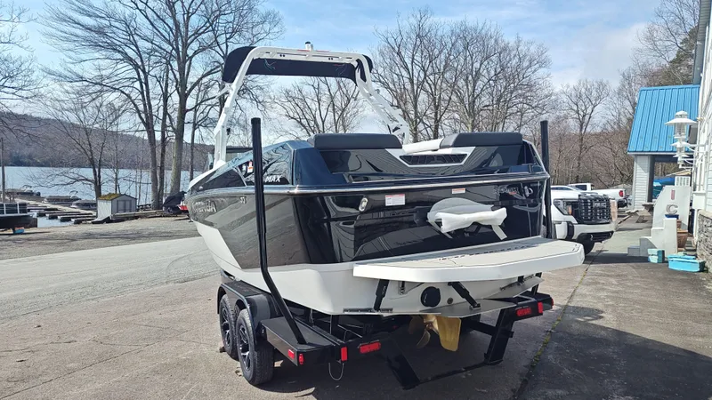 Slide: The Image of 2026 Moomba Max boat on trailer, ready for launch. - 14