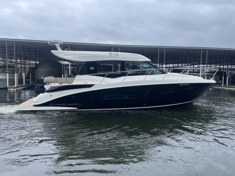 The Image of 2017 Regal 42 Grande Coupe yacht docked at marina. - 1