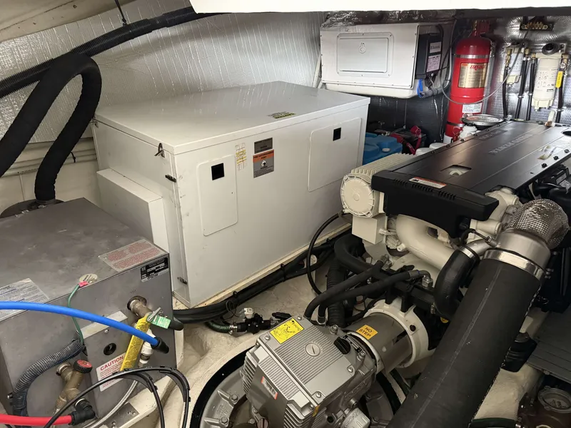 Slide: The Image of Engine room of a 2017 Regal 42 Grande Coupe boat. - 11